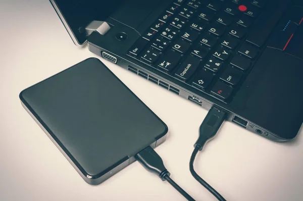 External hard disk (HDD) connected to laptop computer