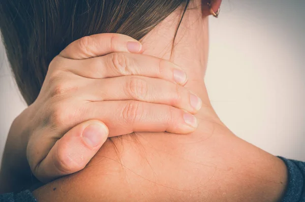 Woman with muscle injury having pain in her neck — Stock Photo, Image