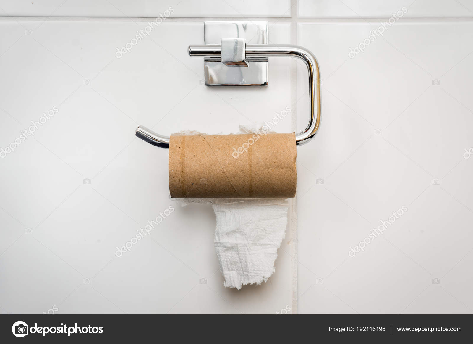 Empty toilet paper roll in public restroom Stock Photo by ©andriano_cz