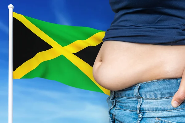 Problema di obesità in Giamaica. Donna in sovrappeso sullo sfondo . — Foto Stock
