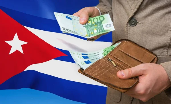 Investing money to Cuba. Rich man with a lot of money.
