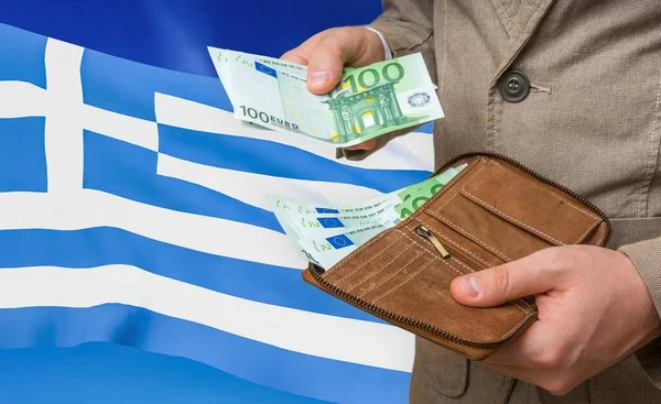 Investing money to Greece. Rich man with a lot of money.