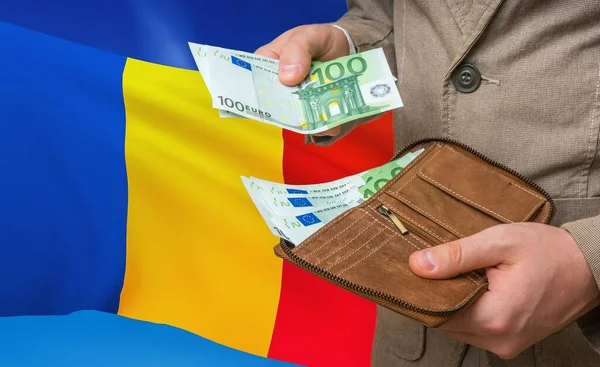 Investing money to Romania. Rich man with a lot of money.