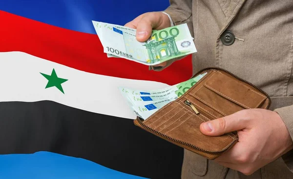 Investing money to Syria. Rich man with a lot of money. — Stock Photo, Image