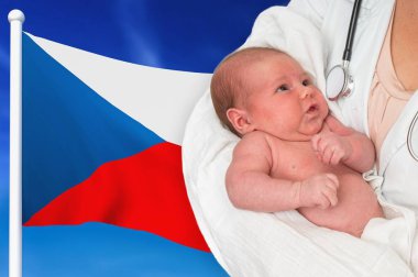 Birth rate in Czech Republic. Newborn baby in hands of doctor. clipart