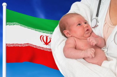 Birth rate in Iran. Newborn baby in hands of doctor. clipart