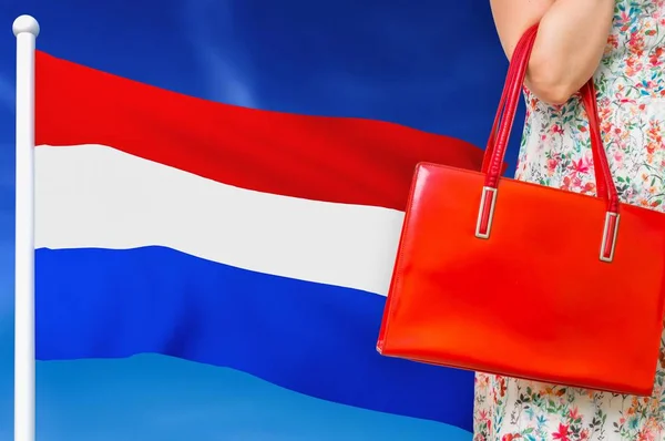 Shopping in Netherlands. Woman with red leather bag. — 스톡 사진
