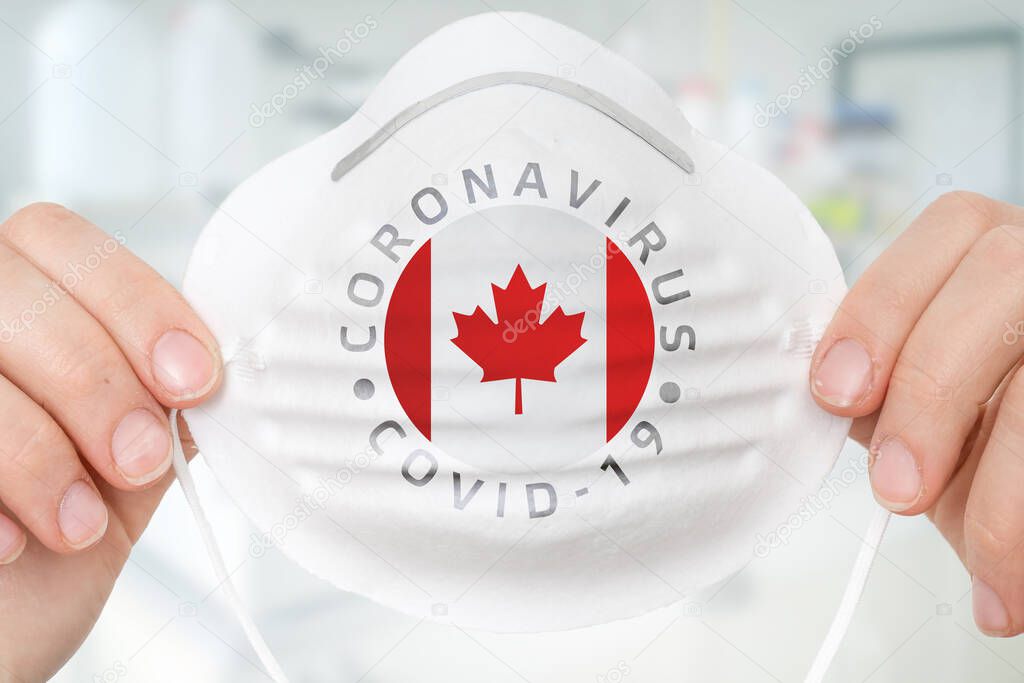 Respirator mask with flag of Canada - Coronavirus COVID-19 epidemic concept