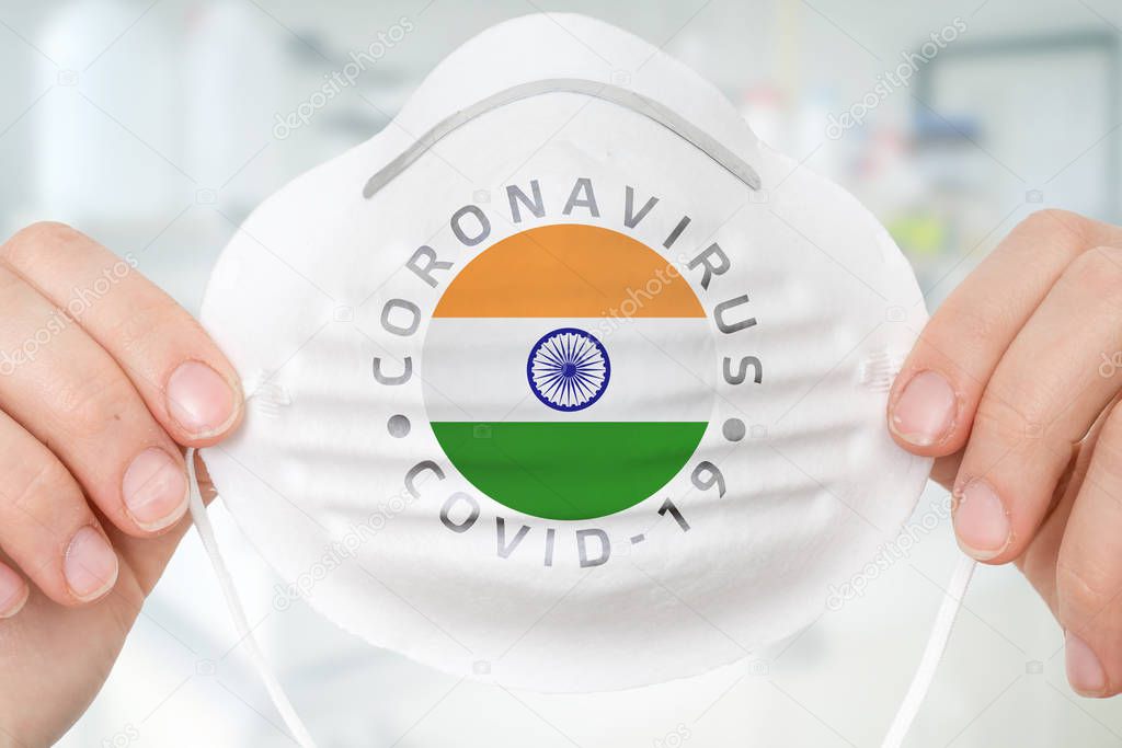 Respirator mask with flag of India - Coronavirus COVID-19 epidemic concept