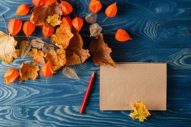 Autumn notes on blue table clipart
