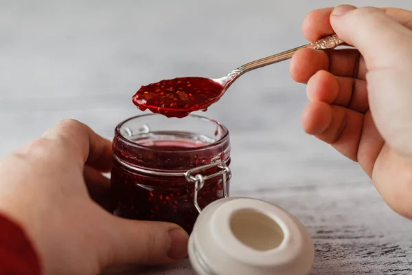 The fruity jam in spoon — Stock Photo, Image