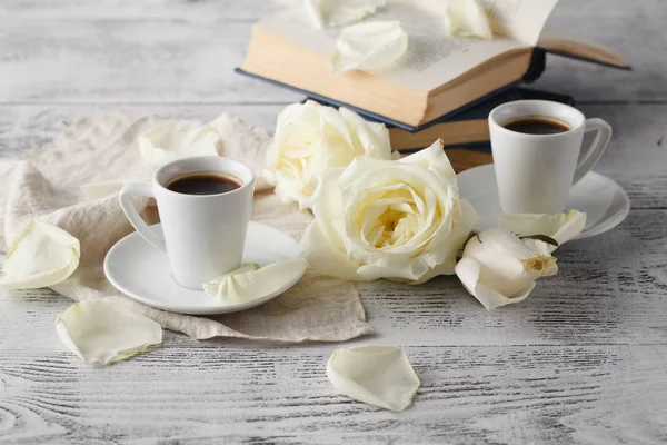 Old books and mail with antique cup of tea — Stock Photo, Image