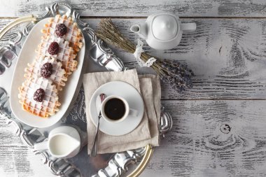 Brussels waffles with berries and coffee clipart