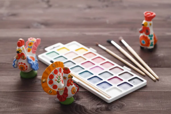 Painting traditional russian Dymkovo toy — Stock Photo, Image