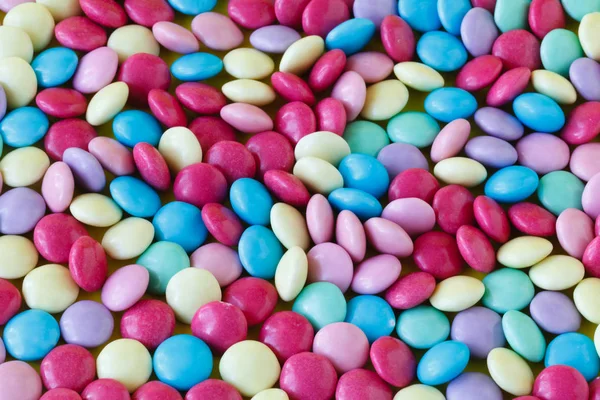 Background of sugared almonds color blue, rose, green, yellow, b