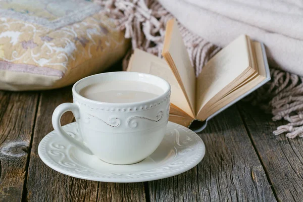 Cozy breakfast with warm plait and hot tea with milk — Stock Photo, Image