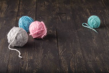 plurality of balls of different colors for knitting clipart