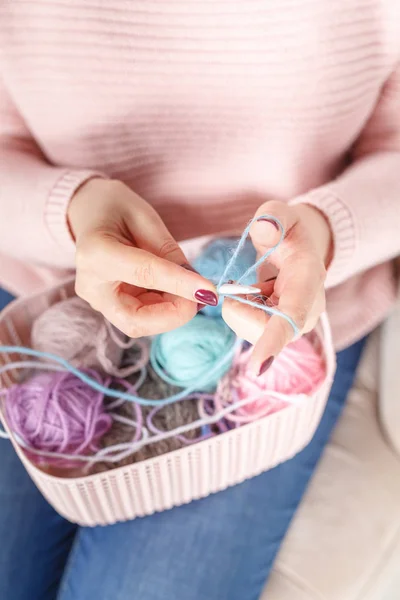 Close up view of female hand with color clew, knitting concept — Stock Photo, Image