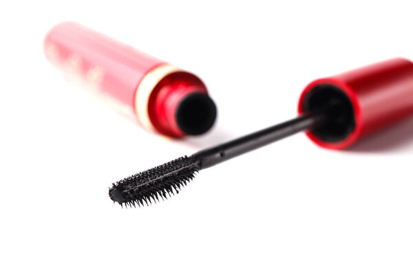 Closeup Mascara Bottle and Brush. Black Mascara wand and Tube Is