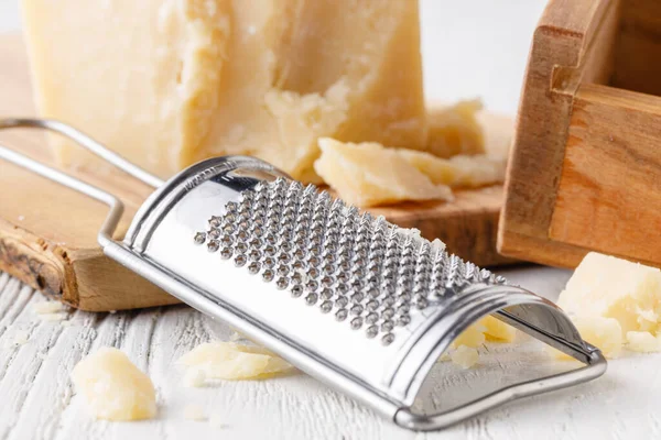 Grated Parmesan cheese and Olive Wood Parmesan Cheese Grater