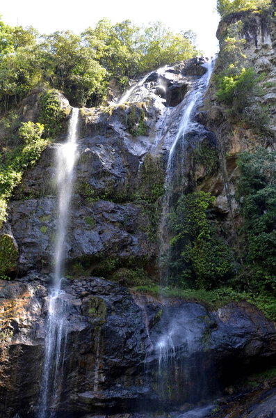 Waterfall in deep forest on the mountain.