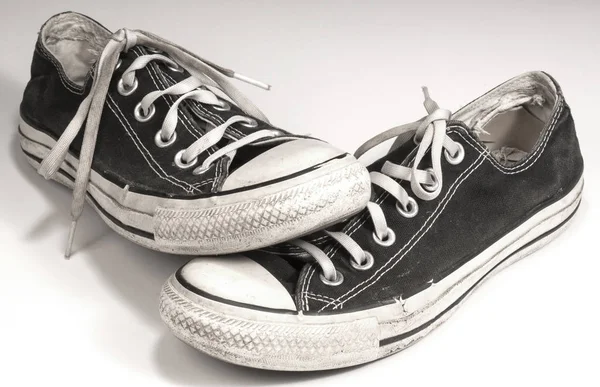 A pair of black canvas sneakers on white background — Stock Photo, Image