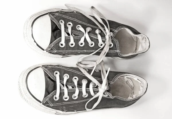 A pair of black canvas sneakers on white background — Stock Photo, Image