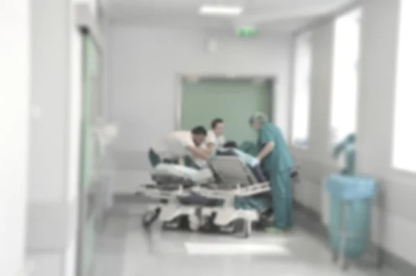 Lékaři a sestry v nemocniční chodbě, rozmazaného pohybu. — Stock fotografie