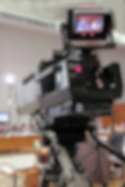 Video camera recording in conference blurred Stock Photo