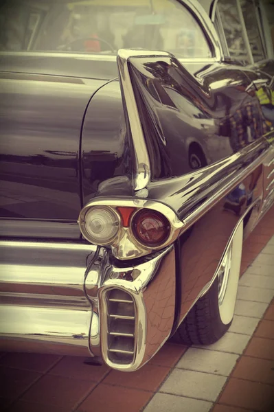 Close up shot of a vintage car in sepia color tone — Stock Photo, Image