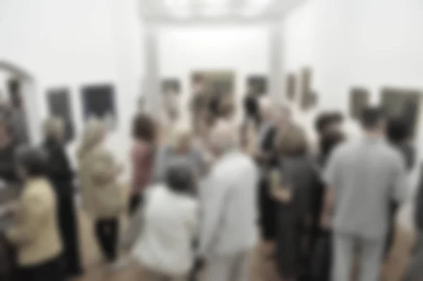 Art exhibition gallery generic background with an intentional blur effect applied. Humans and locations not recognizable.