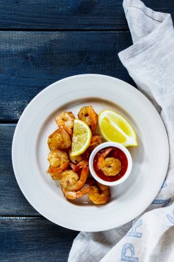 Roasted prawns with sauce clipart