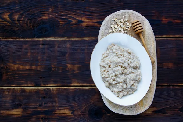 Healthy oatmeal porridge — Stock Photo, Image