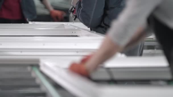 Manual worker assembling PVC doors and windows. — Stock Video