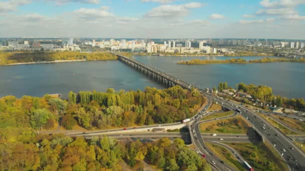 Top view car riding on highway bridge over river. — 图库视频影像