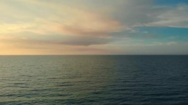 Dramatic clouds above surface of the sea or ocean