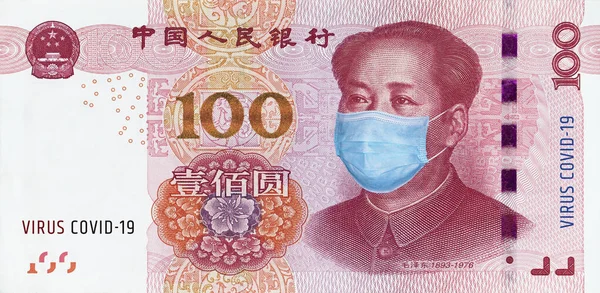 Medical mask on a 100 yuan banknote, concept of the global financial crisis. Medical mask or surgical mask on chinese money. COVID-19 coronavirus. Doctor mask protects against coronovirus.