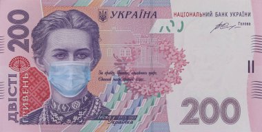 Ukrayna 'da COVID-19 koronavirüsü. 200 Hryvnia banknotu, Lesya Ukrayna 'nın sağlık maskeli hali. Küresel mali ve ekonomik kriz Ukrayna 'yı etkiledi. Ukrayna parası, koronavirüs konsepti, montaj