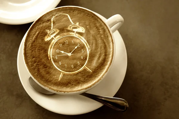 Coffee with clock in the form of overlapping images and light.