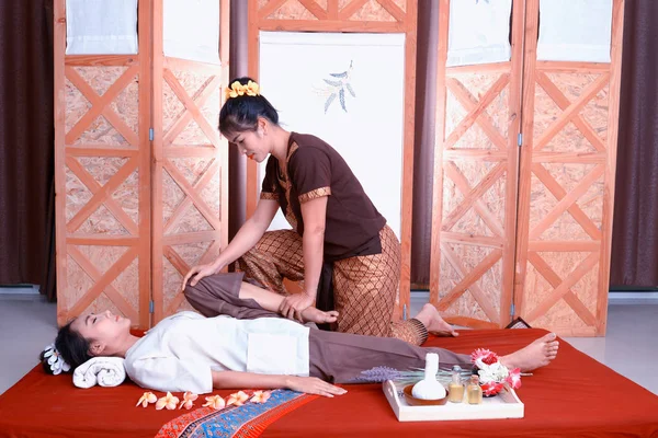 Thai massage. Women pay attention to relaxation and health.