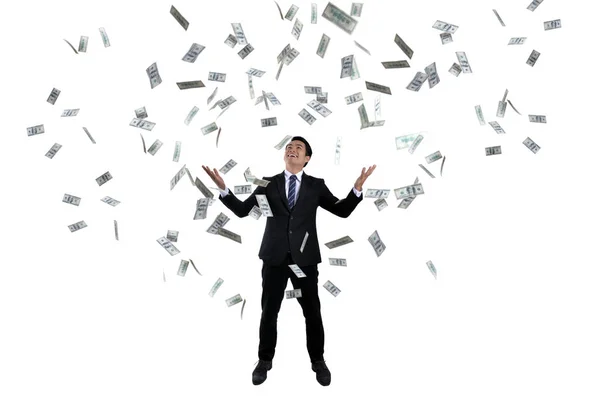 Jonge zakenman met een heleboel geld gebaseerd op succes in busines — Stockfoto