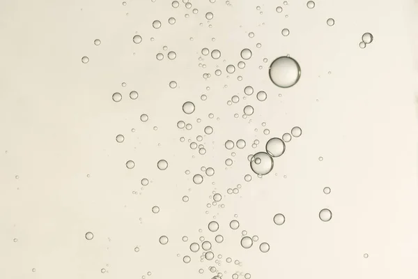 Many Small Fizz Bubbles Soars Light Backgro — Stock Photo, Image