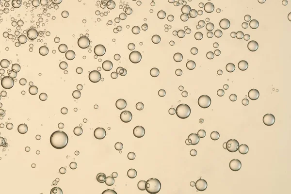 Viele Kleine Luftblasen Vor Verschwommenem Hintergrund — Stockfoto