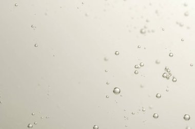 Soda bulanık bir arka plan üzerinde kabarcıklar