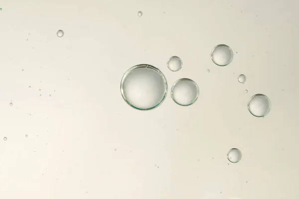 Burbujas de líquido dorado —  Fotos de Stock
