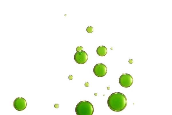 Зеленые пузыри над белым — стоковое фото