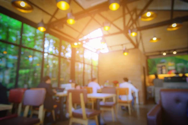 Imagen borrosa cafetería con abstracto fondo de luz bokeh . — Foto de Stock
