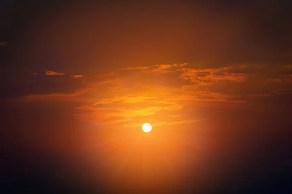 Sunset with clouds on dramatic sky background — Stock Photo, Image