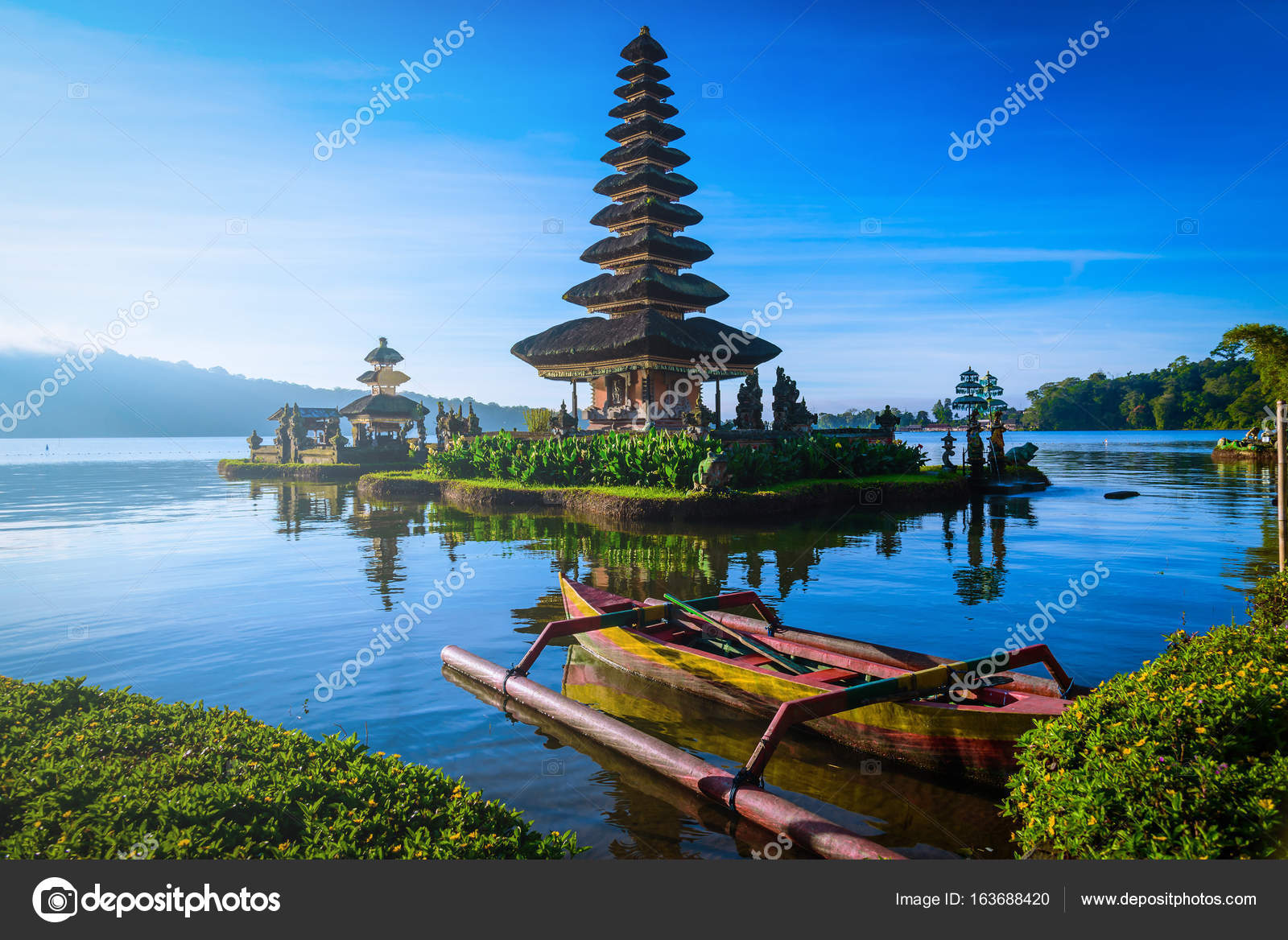 Pura Ulun Danu Bratan Hindu temple with boat on Bratan 