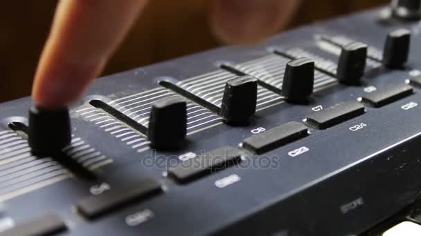 Female hand tunes midi synthesizer keyboard — Stock Video